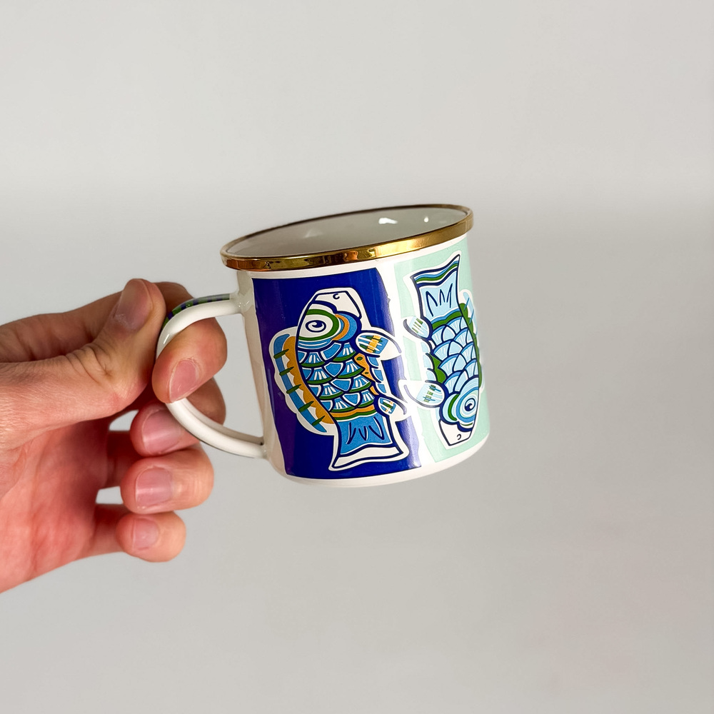 Taza pequeña con asa peces